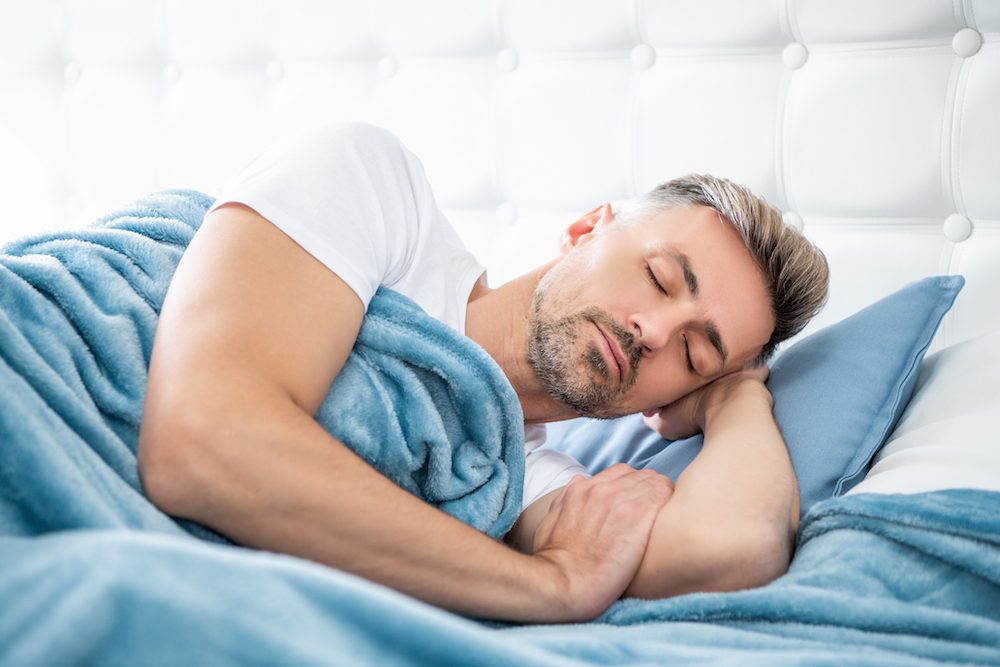stock photo of a man taking a siesta